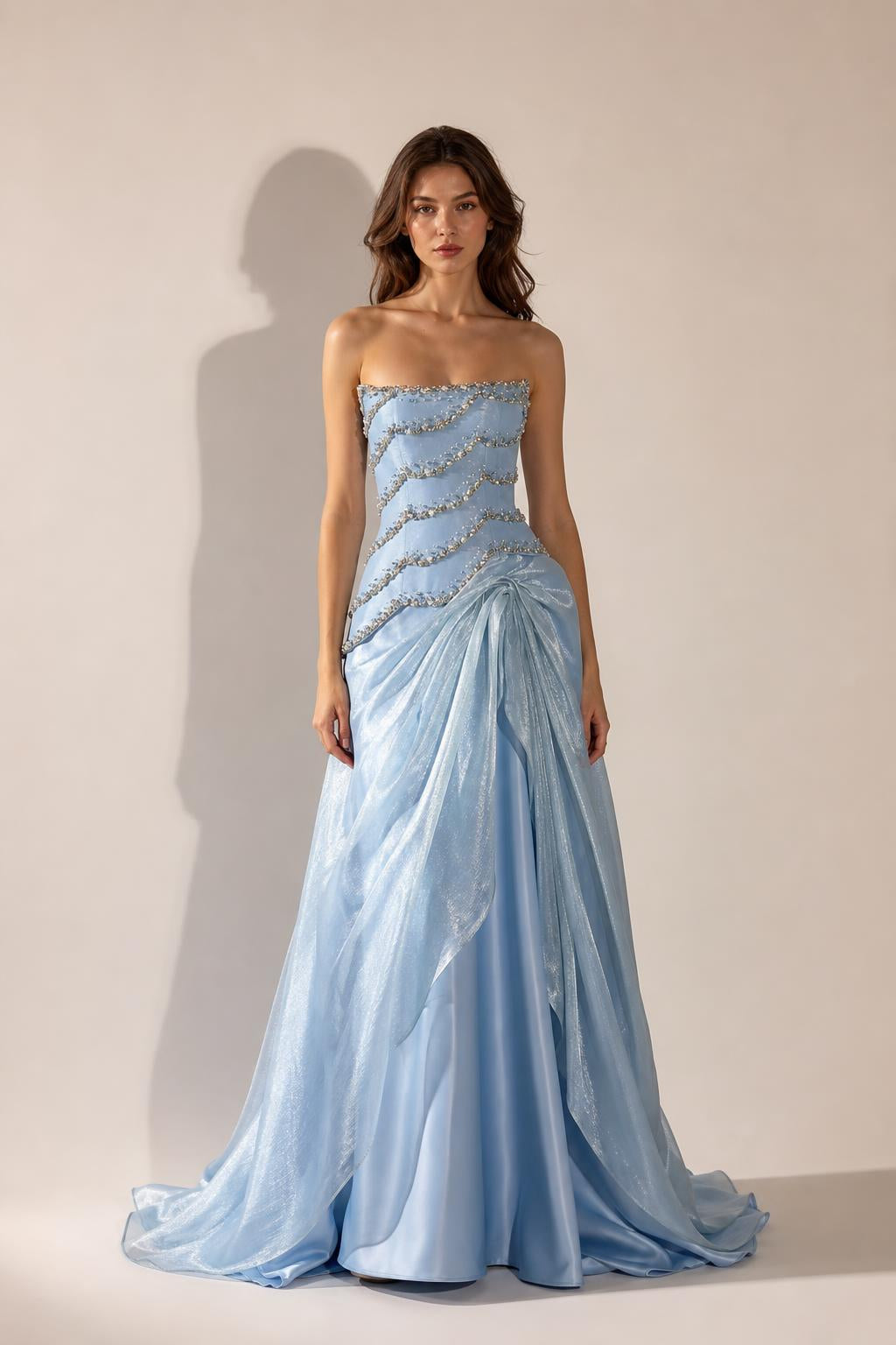 Front view of Light Blue strapless beaded evening gown