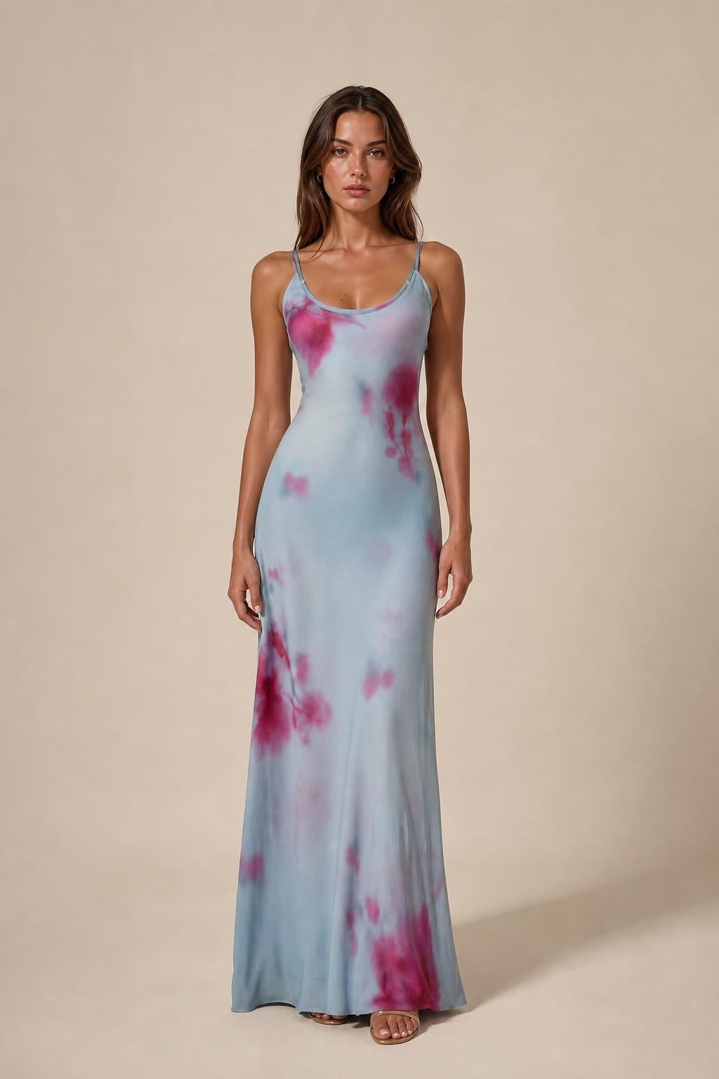 Model wearing light blue tie-dye cami slip maxi dress, front view