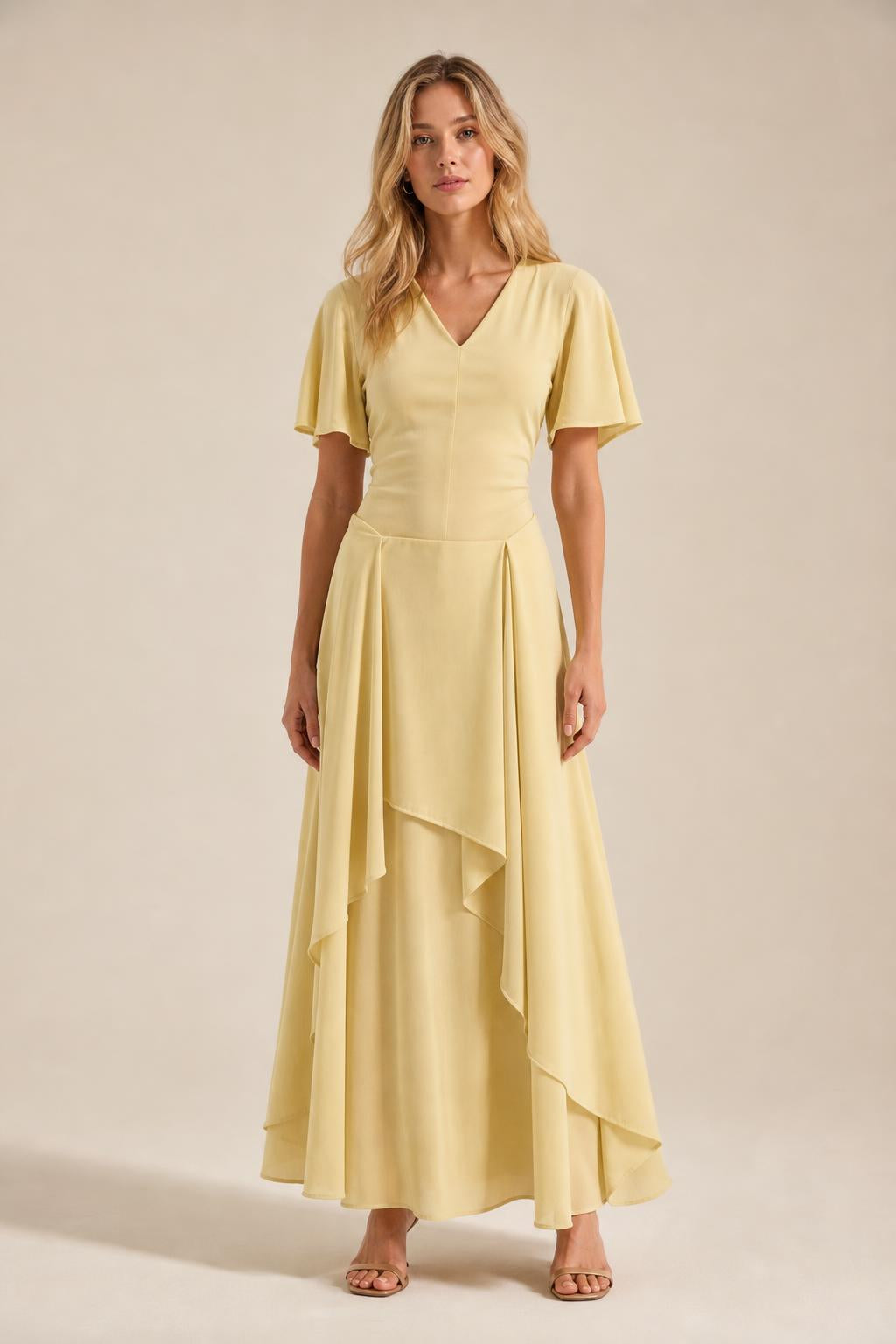 Front view of model wearing yellow V-neck flutter sleeve maxi dress