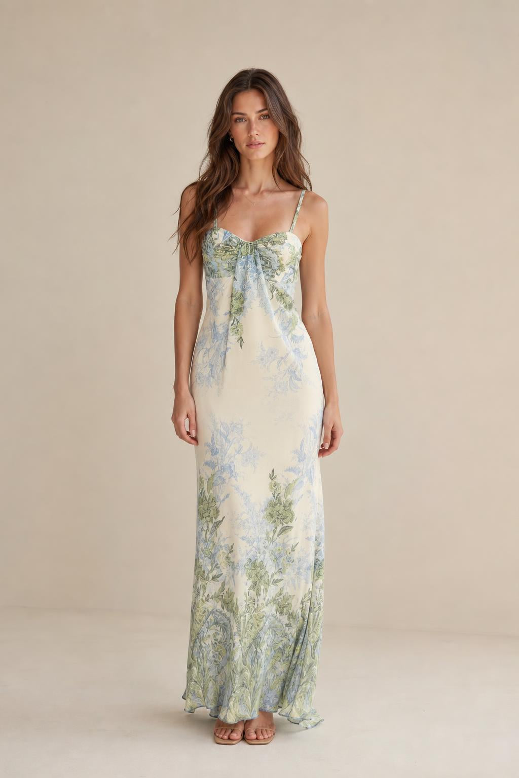 Front view of model wearing ivory floral maxi dress
