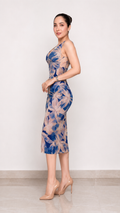 Side view of blue floral sleeveless bodycon midi dress