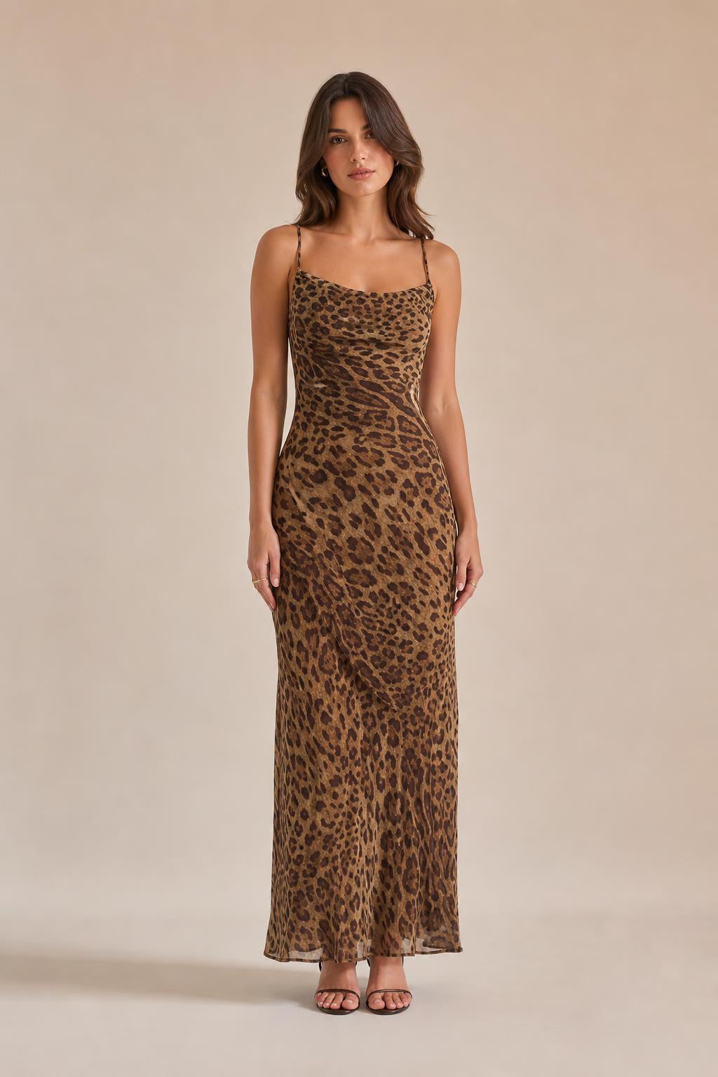 Front view of woman wearing brown leopard print maxi slip dress