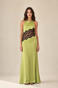 Front view of chartreuse halter neck maxi dress with black lace insert