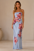 Front view of light blue strapless floral print maxi dress