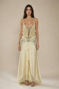 Front view of champagne embellished plunge maxi dress