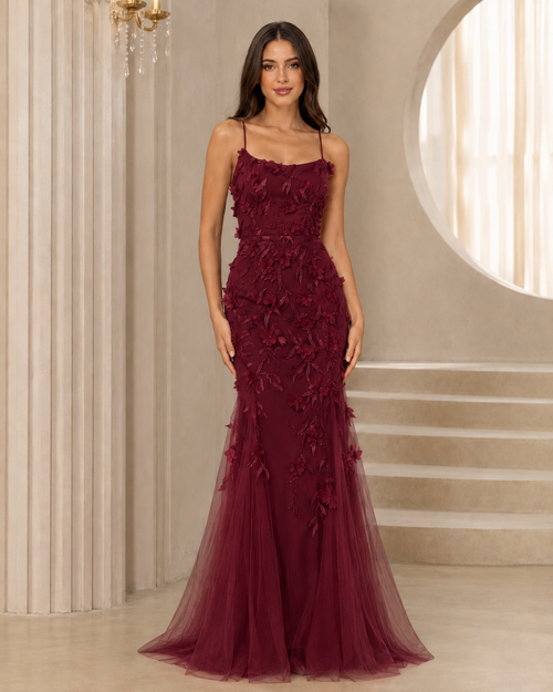 Front view of burgundy spaghetti strap floral appliqué mermaid evening dress