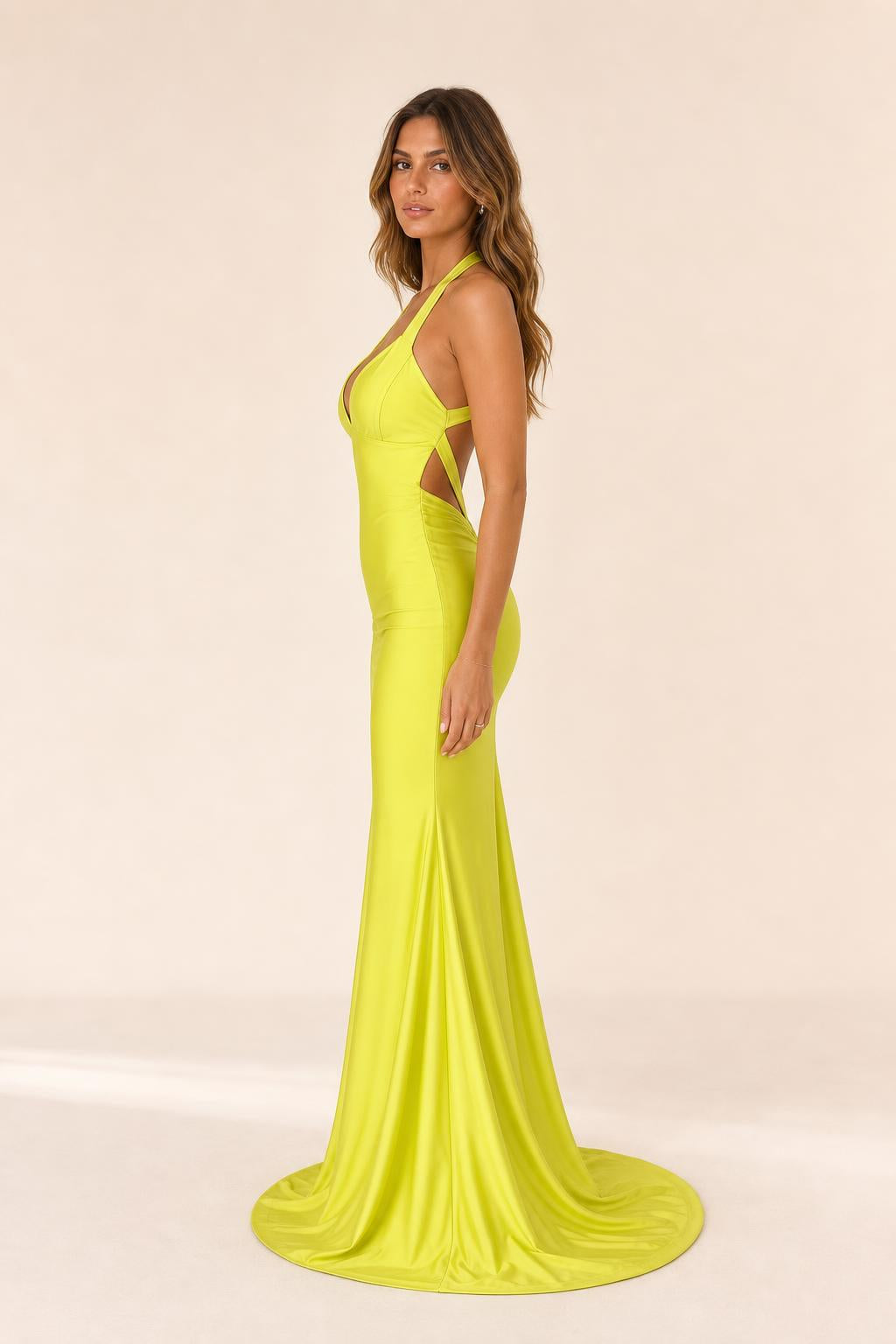 Side profile of yellow halter dress