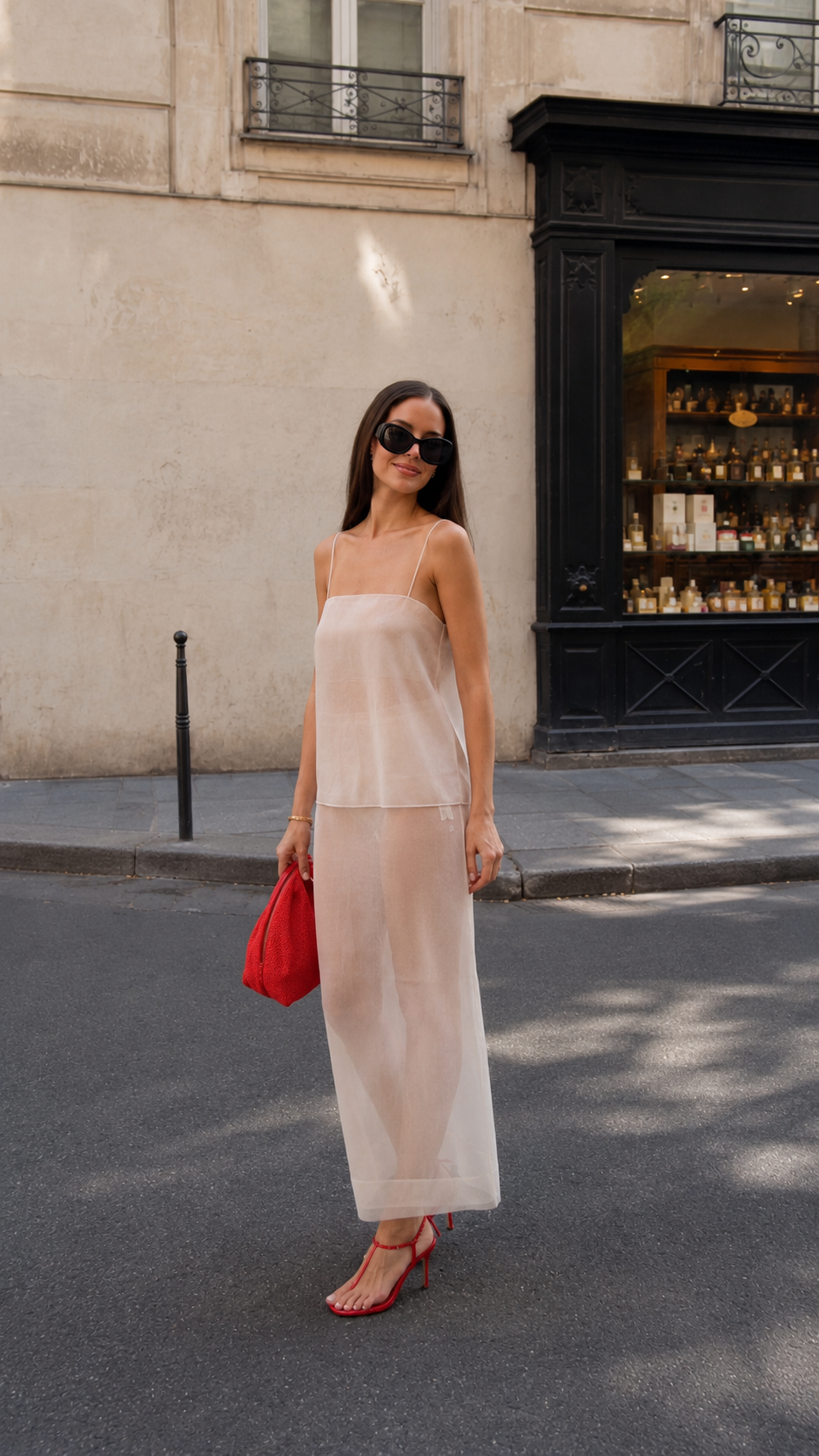 Angled front view of champagne maxi dress set showing soft drape and layered bodice