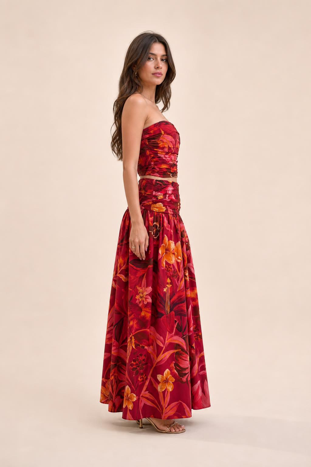 Model wearing red floral two piece set side view