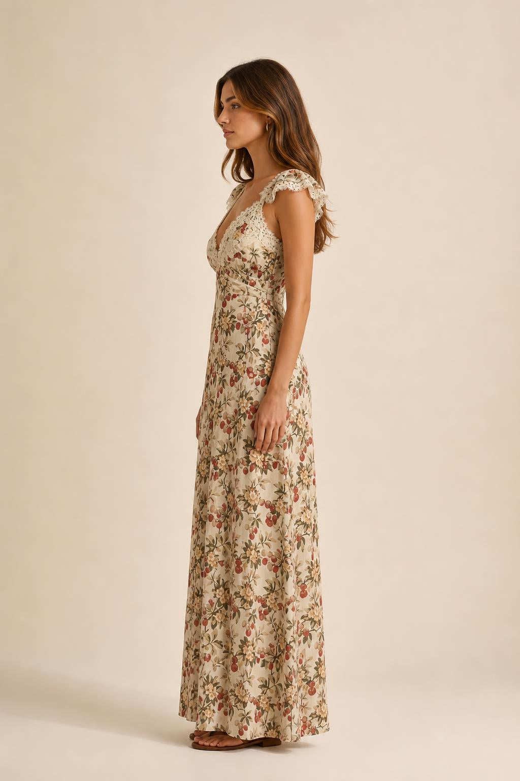 Side profile of beige floral print maxi dress