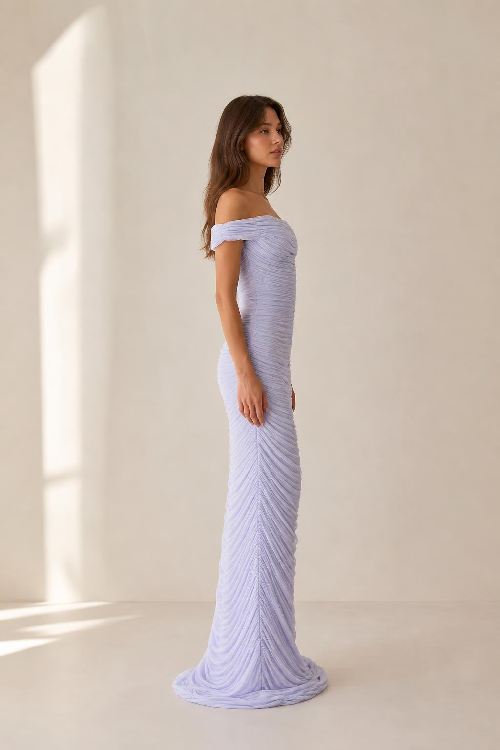 Side profile view of lavender ruched maxi dress
