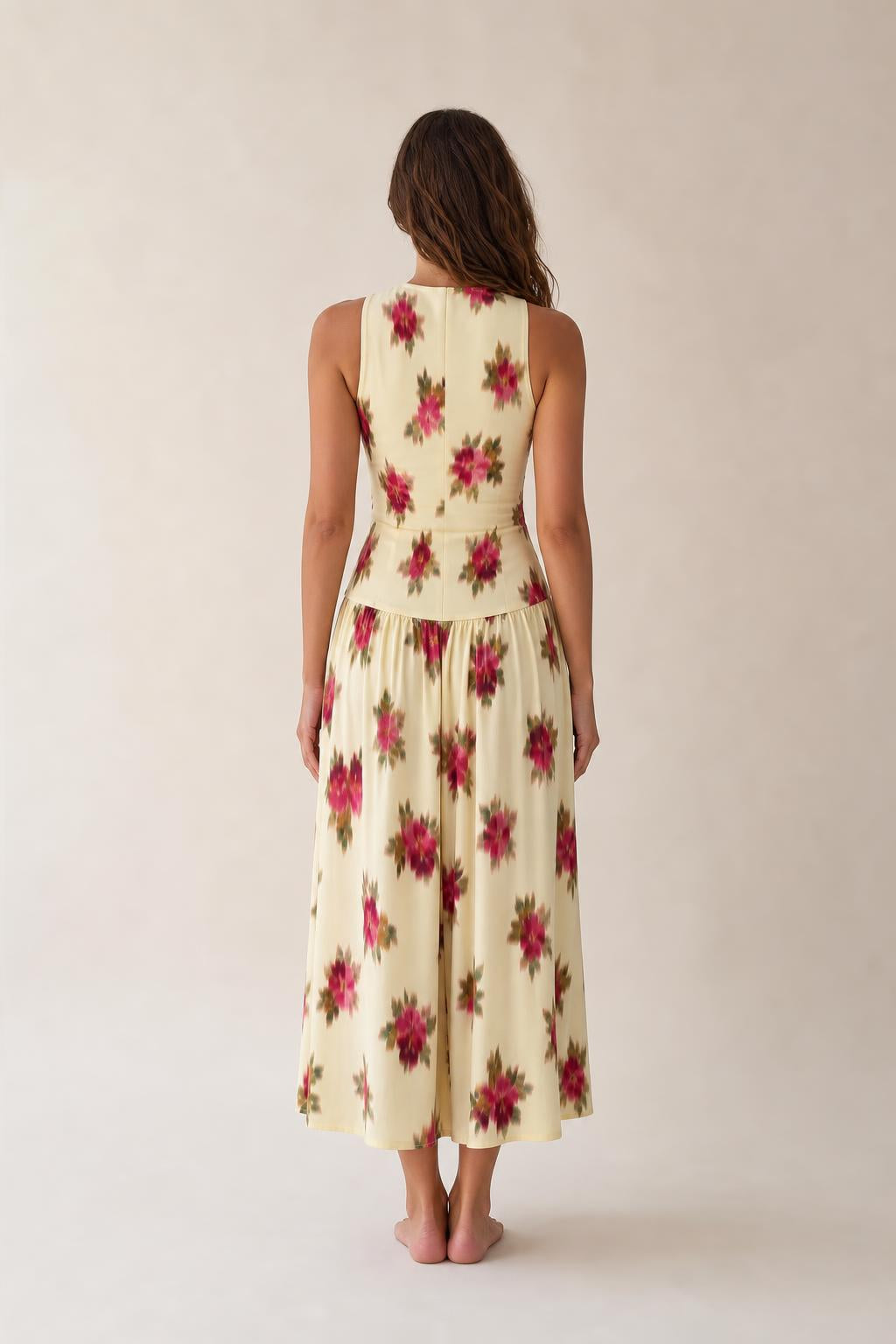 Back view of woman wearing Floral Cream midi dress