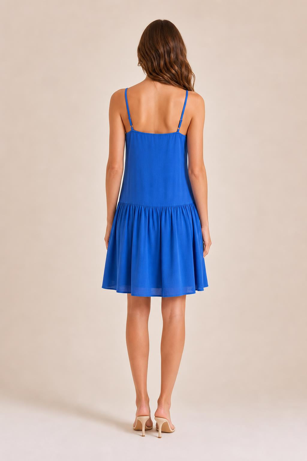 Back view of model in Royal Blue cami mini dress