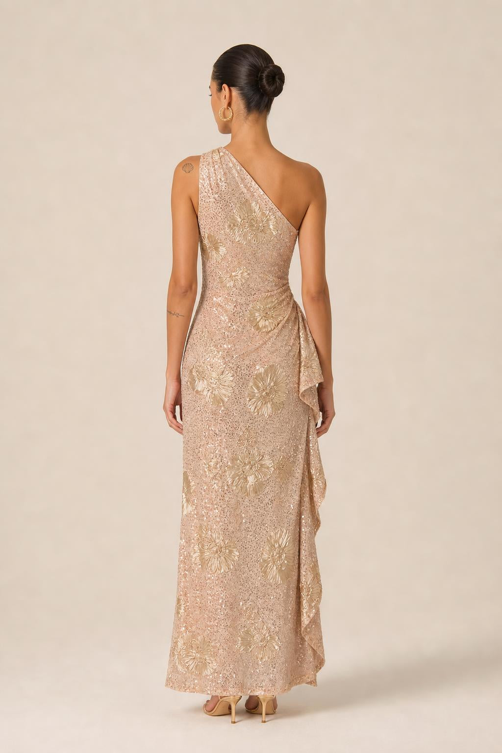 Back view of champagne one-shoulder evening gown