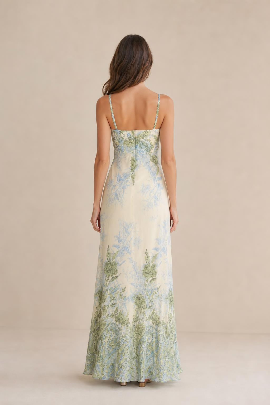 Back view of model wearing ivory floral maxi dress