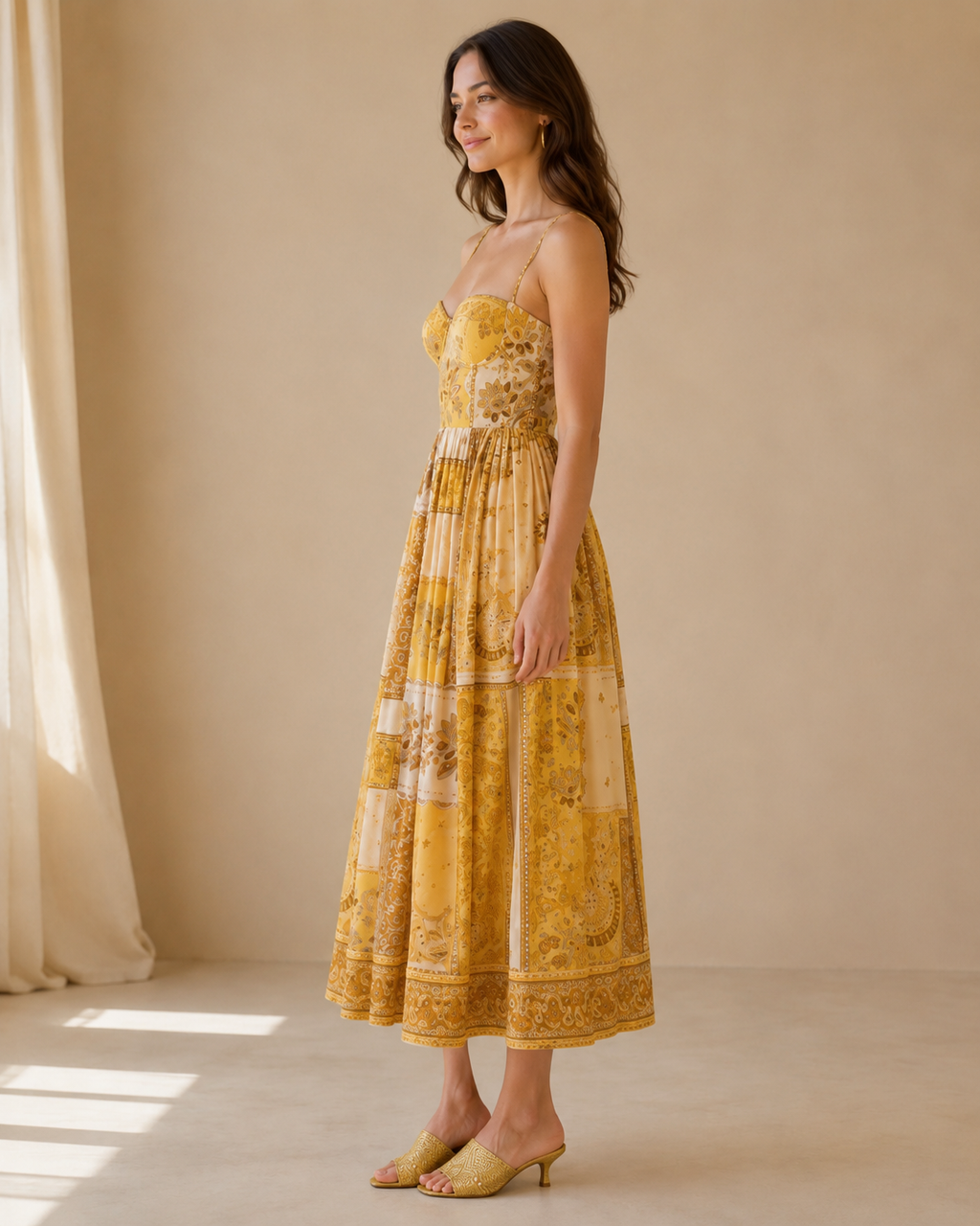 Golden yellow printed spaghetti strap midi dress side view