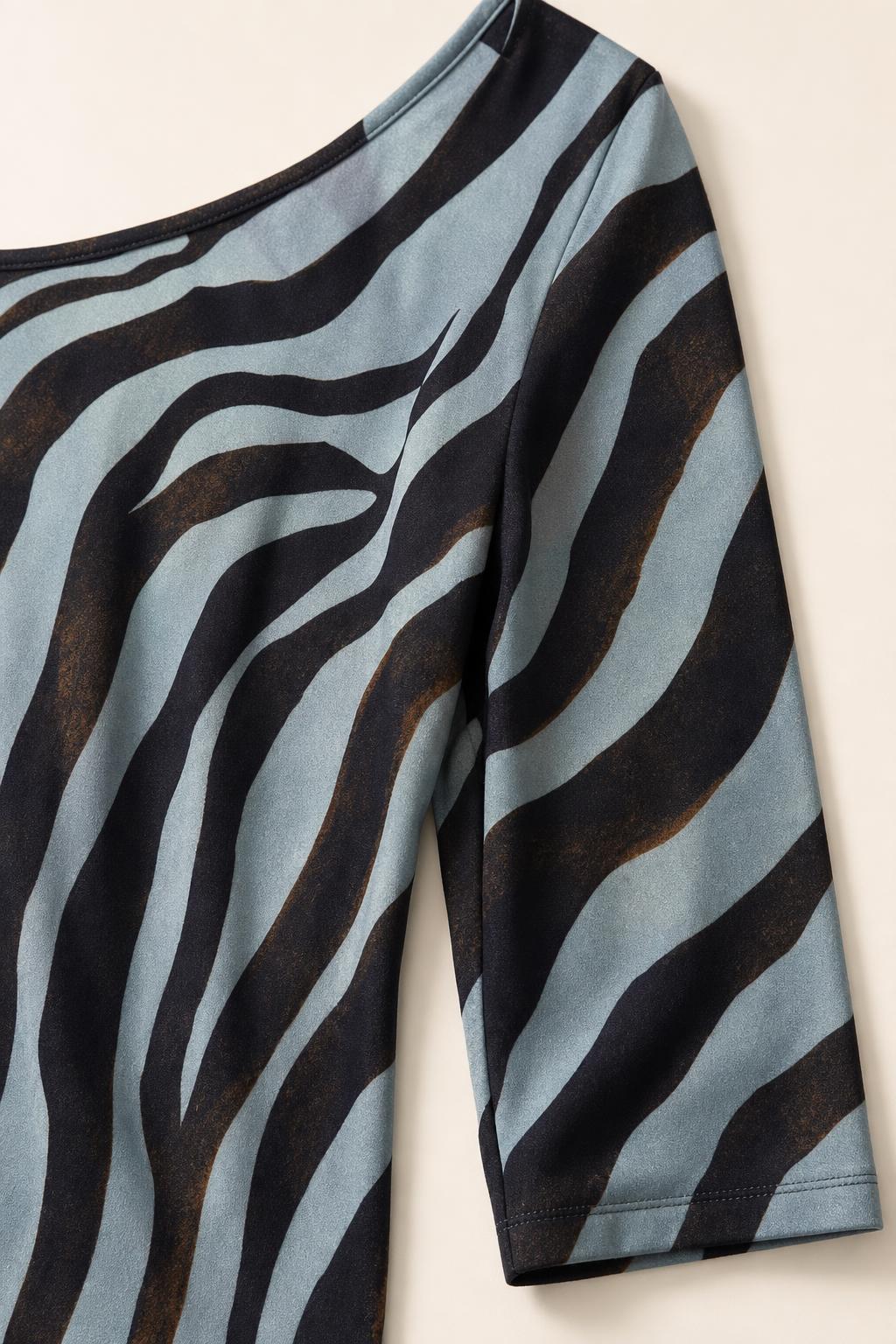Close-up detail of fabric texture and zebra pattern