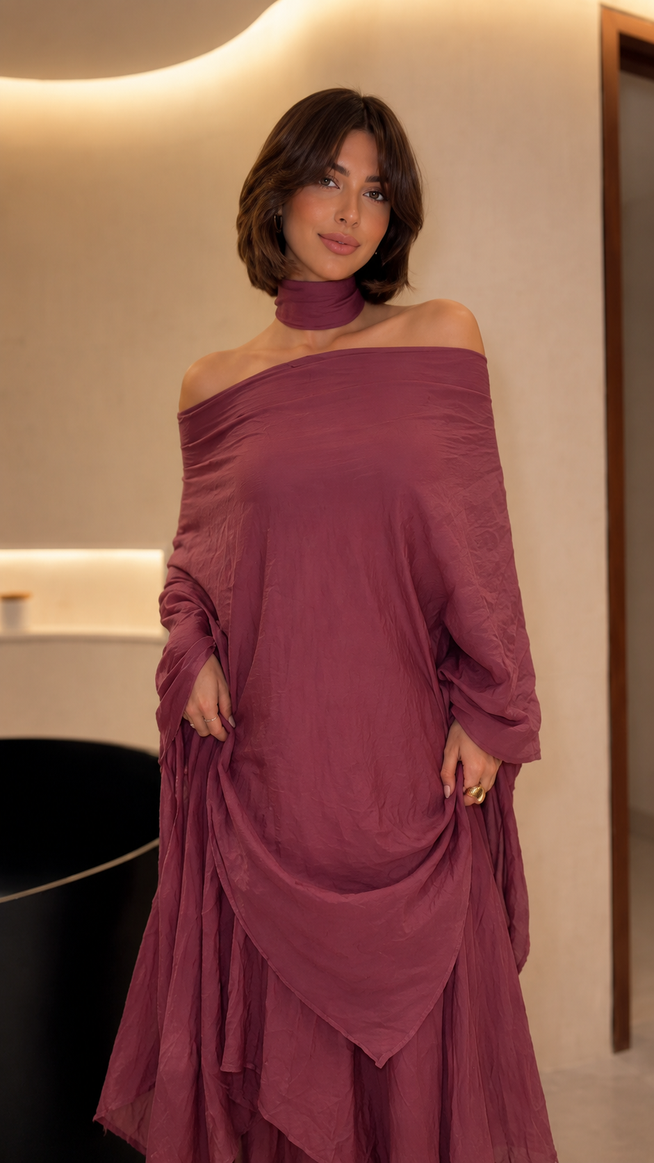 Close front view of mauve draped maxi dress with off-shoulder neckline and matching neck band