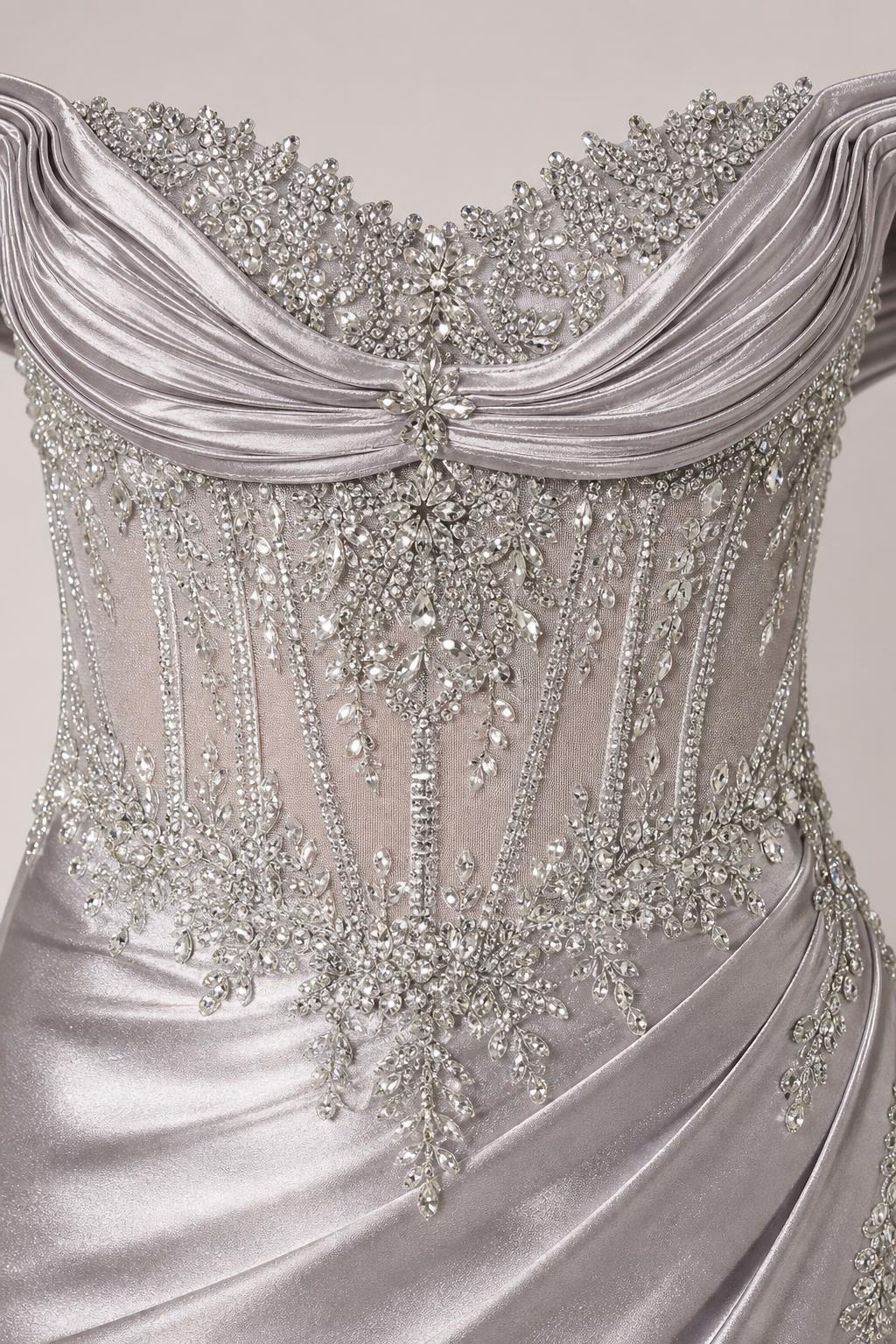 Close-up detail of rhinestone and crystal embellishments on bodice