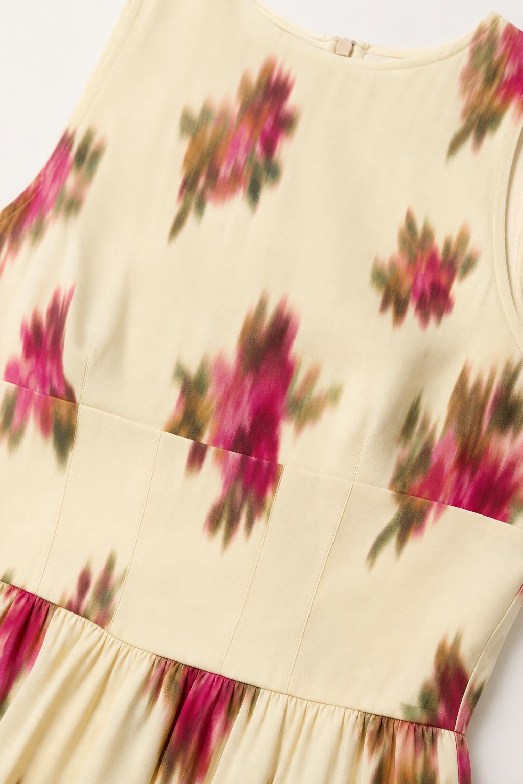 Close-up detail of Floral Cream blurred floral pattern and waist seam