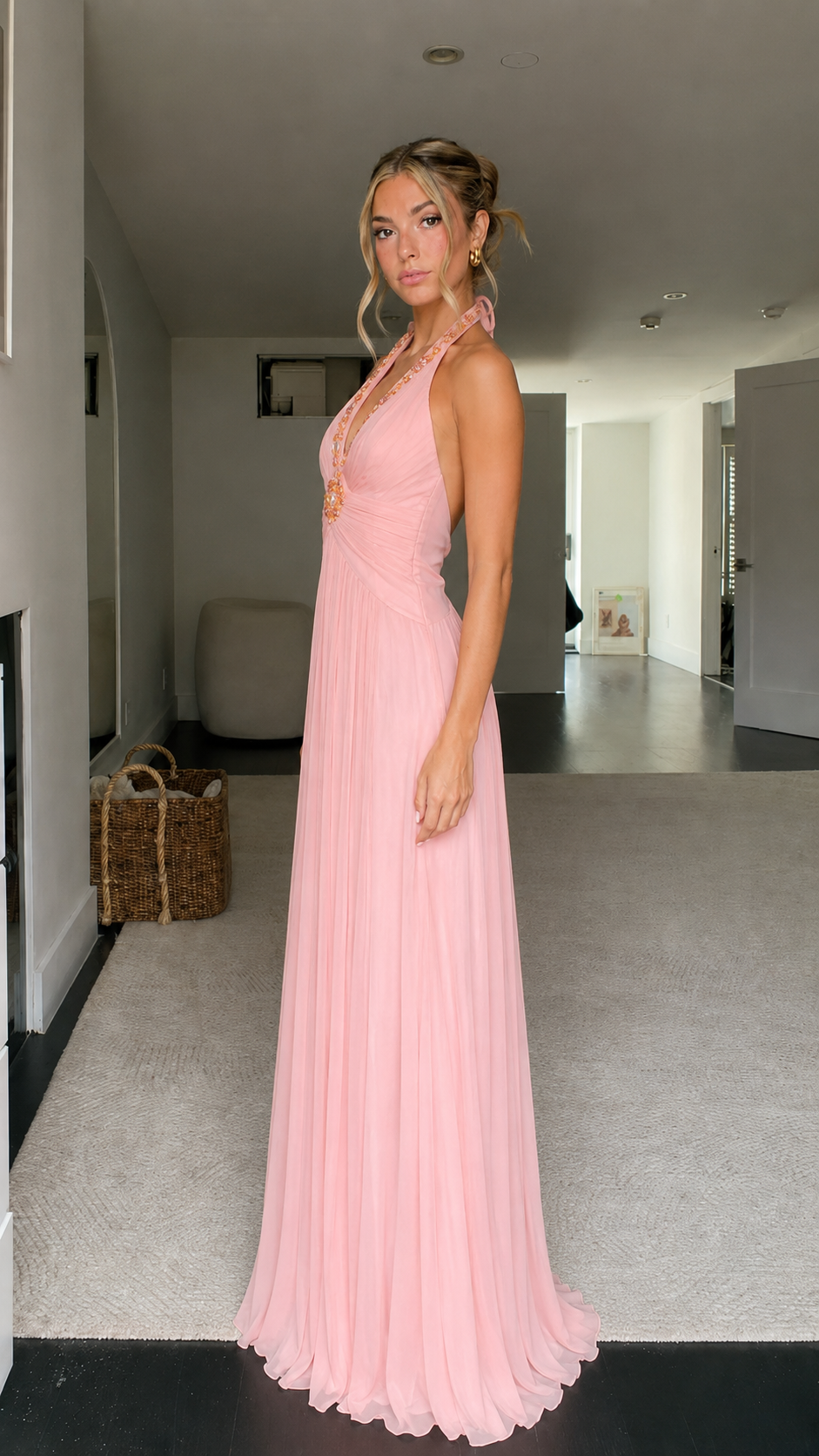 Side view of blush pink beaded halter pleated maxi dress