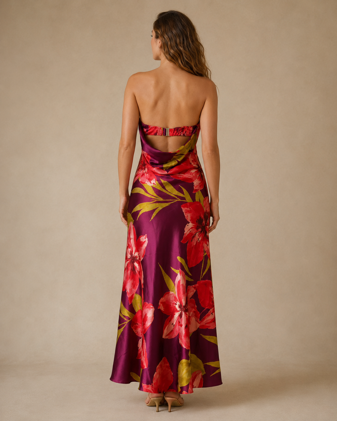 Back view of berry floral strapless maxi dress showing open upper back and fitted silhouette