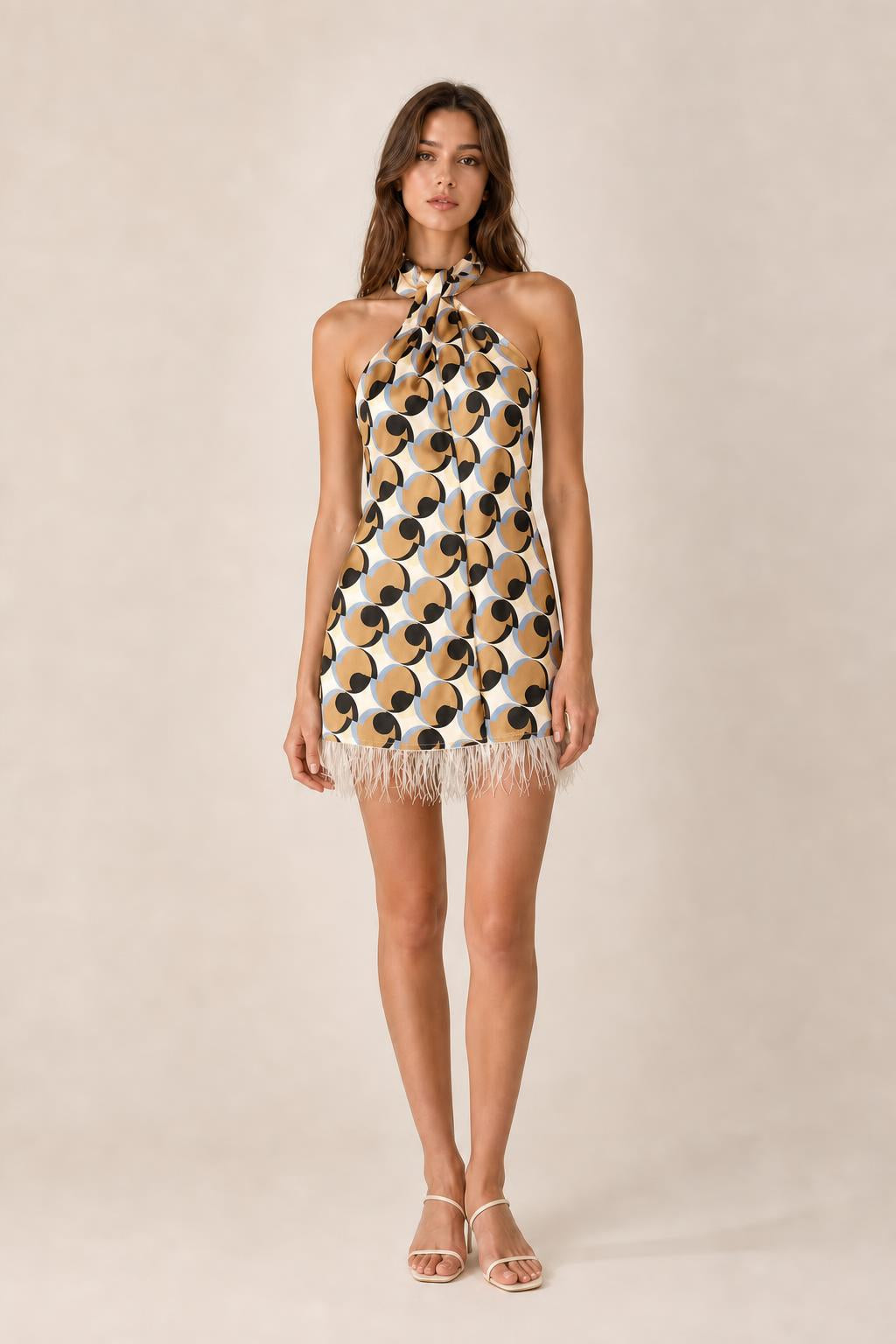 Front view of multi color variant geometric halter mini dress