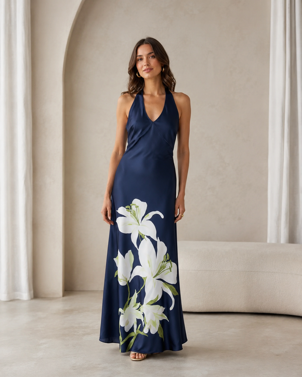 Front view of navy floral halter maxi dress in maxi length